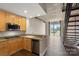 Modern kitchen features stainless steel appliances, granite countertops, and wooden cabinets at 710 W Trade St # 309, Charlotte, NC 28202