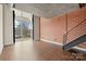 Open-concept living room features exposed brick, duct work, and modern design at 710 W Trade St # 309, Charlotte, NC 28202