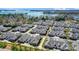 Aerial view of a new housing community on the water featuring well-maintained lawns and coordinated architecture at 8146 Viscount Ct, Denver, NC 28037