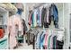 Walk-in closet with rods and shelves for optimal storage and organization at 8146 Viscount Ct, Denver, NC 28037