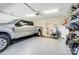 Spacious garage featuring epoxy flooring and ample storage, plus room for a full-size pickup truck at 8146 Viscount Ct, Denver, NC 28037