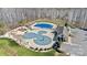 Aerial view of Mickey Mouse shaped community pool and clubhouse at 8534 Loxton Cir, Charlotte, NC 28214
