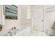 Bright bathroom featuring a soaking tub and neutral decor at 8534 Loxton Cir, Charlotte, NC 28214