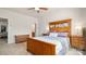 Charming bedroom with hardwood furniture and views to the living room and bathroom at 8534 Loxton Cir, Charlotte, NC 28214
