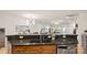Open kitchen featuring granite counters, stainless steel appliances, and open floor plan at 8534 Loxton Cir, Charlotte, NC 28214