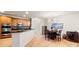 Spacious kitchen with granite countertops, wine cooler, and dining area at 8534 Loxton Cir, Charlotte, NC 28214