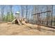 Community playground featuring slides, climbing structures, swings, and a safety-surfaced play area at 8534 Loxton Cir, Charlotte, NC 28214