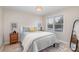 Bedroom with neutral tones and natural light at 9008 Robinson Church Rd, Harrisburg, NC 28075