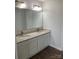 Bathroom featuring a double sink vanity with granite countertops and new fixtures at 9450 Paul Payne Store Rd, Stony Point, NC 28678
