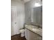 The bathroom has a vanity with granite and a nice toilet that is ready to be used at 9450 Paul Payne Store Rd, Stony Point, NC 28678