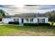 Charming single-story home with manicured lawn, inviting front porch, and attached garage at 9450 Paul Payne Store Rd, Stony Point, NC 28678