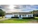 Charming single-story home with manicured lawn, inviting front porch, and attached garage at 9450 Paul Payne Store Rd, Stony Point, NC 28678