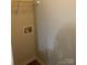A convenient laundry area with wall shelving and access for washing machine hookups at 9450 Paul Payne Store Rd, Stony Point, NC 28678