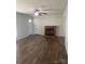 Bright living room featuring a fireplace and hardwood floors at 9450 Paul Payne Store Rd, Stony Point, NC 28678