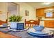 Close-up of dining table with place settings and a decorative plant at 9534 Markus Dr, Mint Hill, NC 28227