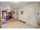 Bright kitchen adjacent to the dining area, featuring wood cabinets and ample space at 9534 Markus Dr, Mint Hill, NC 28227