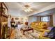 Cozy living room showcasing a brick fireplace, comfortable furniture, and an inviting atmosphere at 9534 Markus Dr, Mint Hill, NC 28227