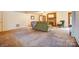 Open living area featuring a brick fireplace and classic decor at 9534 Markus Dr, Mint Hill, NC 28227