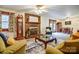 Inviting living room with brick fireplace, classic furnishings, and seamless flow to the dining area at 9534 Markus Dr, Mint Hill, NC 28227