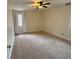 Bright bedroom featuring neutral carpet, and lots of natural light at 100 Chadmore Dr, Charlotte, NC 28270