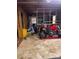 Unfinished garage space with a motorcycle and storage at 100 Chadmore Dr, Charlotte, NC 28270