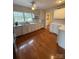 Charming kitchen with white cabinets, hardwood floors, and natural light at 100 Chadmore Dr, Charlotte, NC 28270