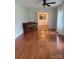 Spacious living room featuring hardwood floors, a piano, and lots of natural light at 100 Chadmore Dr, Charlotte, NC 28270