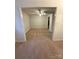 Bright living room featuring a ceiling fan and carpeted floors at 100 Chadmore Dr, Charlotte, NC 28270