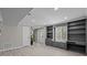 Finished basement with built-in shelving and a desk area at 10405 Club Car Ct, Mint Hill, NC 28227