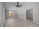Bright bedroom featuring hardwood flooring and ample natural light at 10405 Club Car Ct, Mint Hill, NC 28227