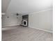 Large living room featuring new floors, trim, and a modern fireplace at 10405 Club Car Ct, Mint Hill, NC 28227