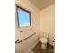 Bathroom with grab bars, natural light and wood-look flooring at 105 Baymount Dr, Statesville, NC 28625