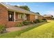 Charming front porch with brick accents and space for outdoor seating at 105 Baymount Dr, Statesville, NC 28625