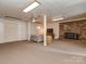 Finished basement featuring fireplace, a light color palette, neutral carpeting, and ample space at 109 Joe Teague Rd, Hickory, NC 28601