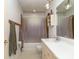 This bathroom features a sink with a white vanity, commode, and shower/tub combo at 109 Joe Teague Rd, Hickory, NC 28601