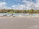 Paved boat ramp leading to a lake surrounded by lush greenery at 109 Joe Teague Rd, Hickory, NC 28601
