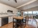 Bright kitchen with a center island, adjacent to an informal dining area with expansive windows and natural light at 109 Joe Teague Rd, Hickory, NC 28601