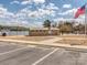 Parking lot with a building and lake in the background at 109 Joe Teague Rd, Hickory, NC 28601