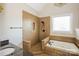 Bright bathroom featuring a tiled shower and tub with modern fixtures and granite countertop vanity at 1125 Bugle Ln, Newton, NC 28658
