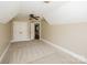 A large room with a fan, 2 closets, baseboard trim, neutral carpet and paint at 1125 Bugle Ln, Newton, NC 28658