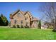 Charming two-story home with a well-maintained lawn and mature tree, set in a desirable location at 1125 Bugle Ln, Newton, NC 28658
