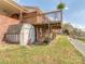 Backyard with a wooden deck, storage shed, and gentle slope, offering functional outdoor space at 114 Joe Teague Rd, Hickory, NC 28601