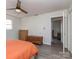 Spacious bedroom with neutral walls, hardwood floors, and a ceiling fan at 114 Joe Teague Rd, Hickory, NC 28601