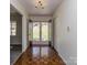 Inviting entryway boasting gleaming parquet floors and a view to the outside at 114 Joe Teague Rd, Hickory, NC 28601