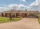 Traditional brick home with attached carport and lush lawn at 114 Joe Teague Rd, Hickory, NC 28601