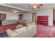 Cozy living room featuring a piano, comfortable seating, and ample natural light at 114 Joe Teague Rd, Hickory, NC 28601