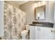 Bathroom featuring granite countertop, decorative mirror and shower with decorative shower curtain at 122 Blandina Ct, Fort Mill, SC 29708
