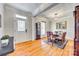 Formal dining room with hardwood floors, elegant lighting, and classic furnishings for Gathering gatherings at 122 Blandina Ct, Fort Mill, SC 29708