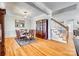 Elegant dining room featuring hardwood floors, wainscoting, and stairs to the upper level at 122 Blandina Ct, Fort Mill, SC 29708