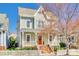 Charming two-story home with a welcoming front porch and a bright orange front door at 122 Blandina Ct, Fort Mill, SC 29708